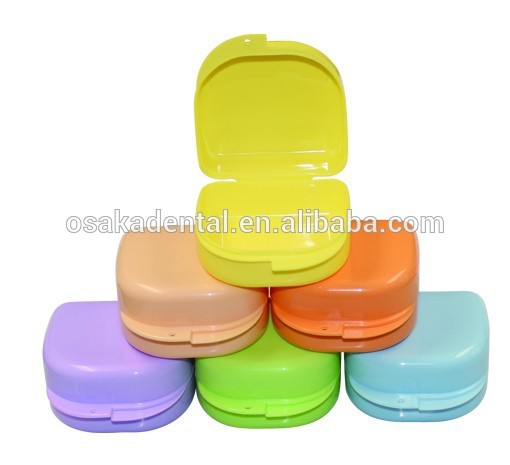 Caja plástica colorida de la dentadura para la venta limpia